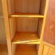Vintage wardrobe with mirror and tapered legs.