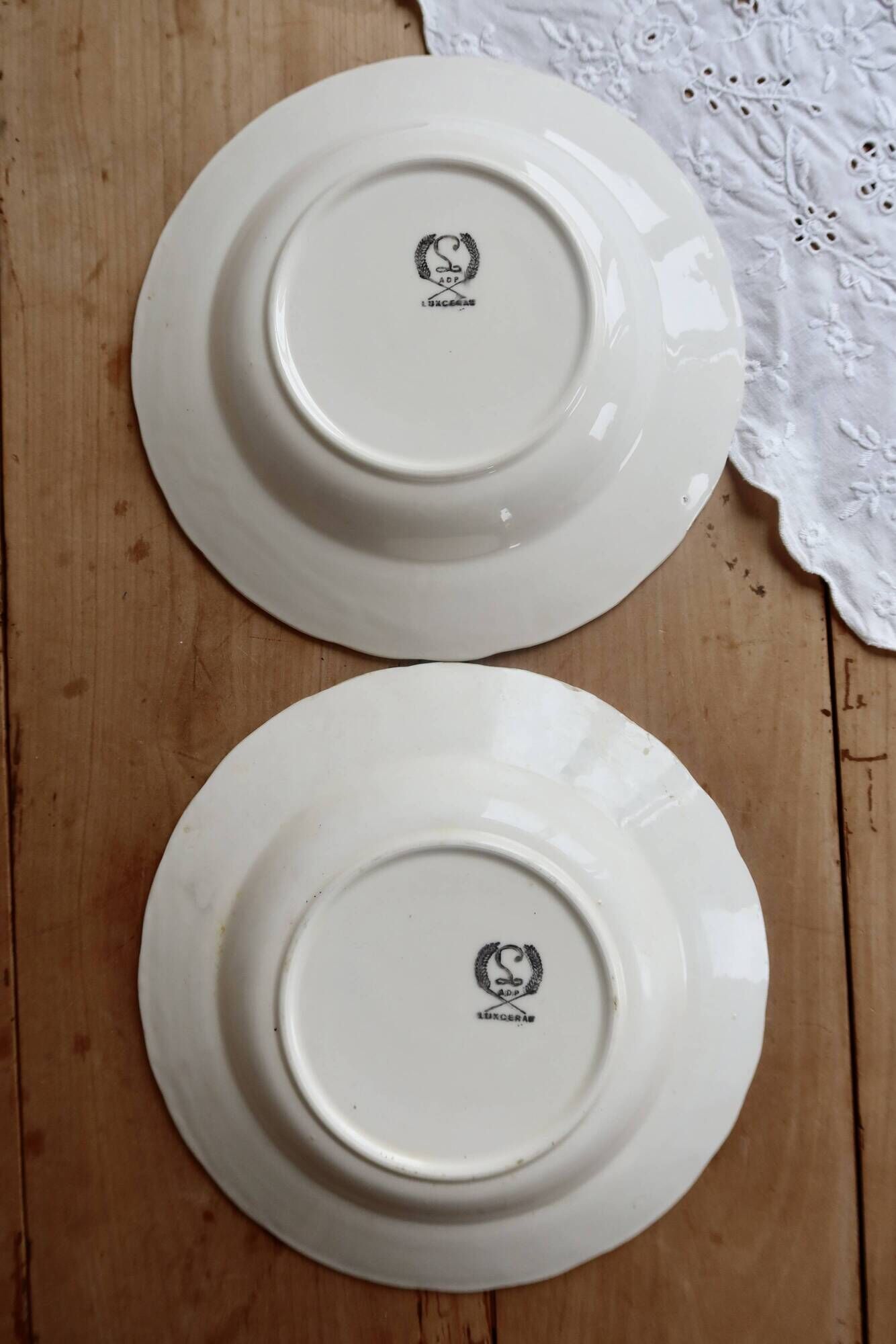 Pair of antique ivory faience deep plates ADP Luxcerae