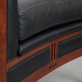 Art Deco design armchair with black leather with decorative stitching