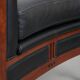 Art Deco design armchair with black leather with decorative stitching