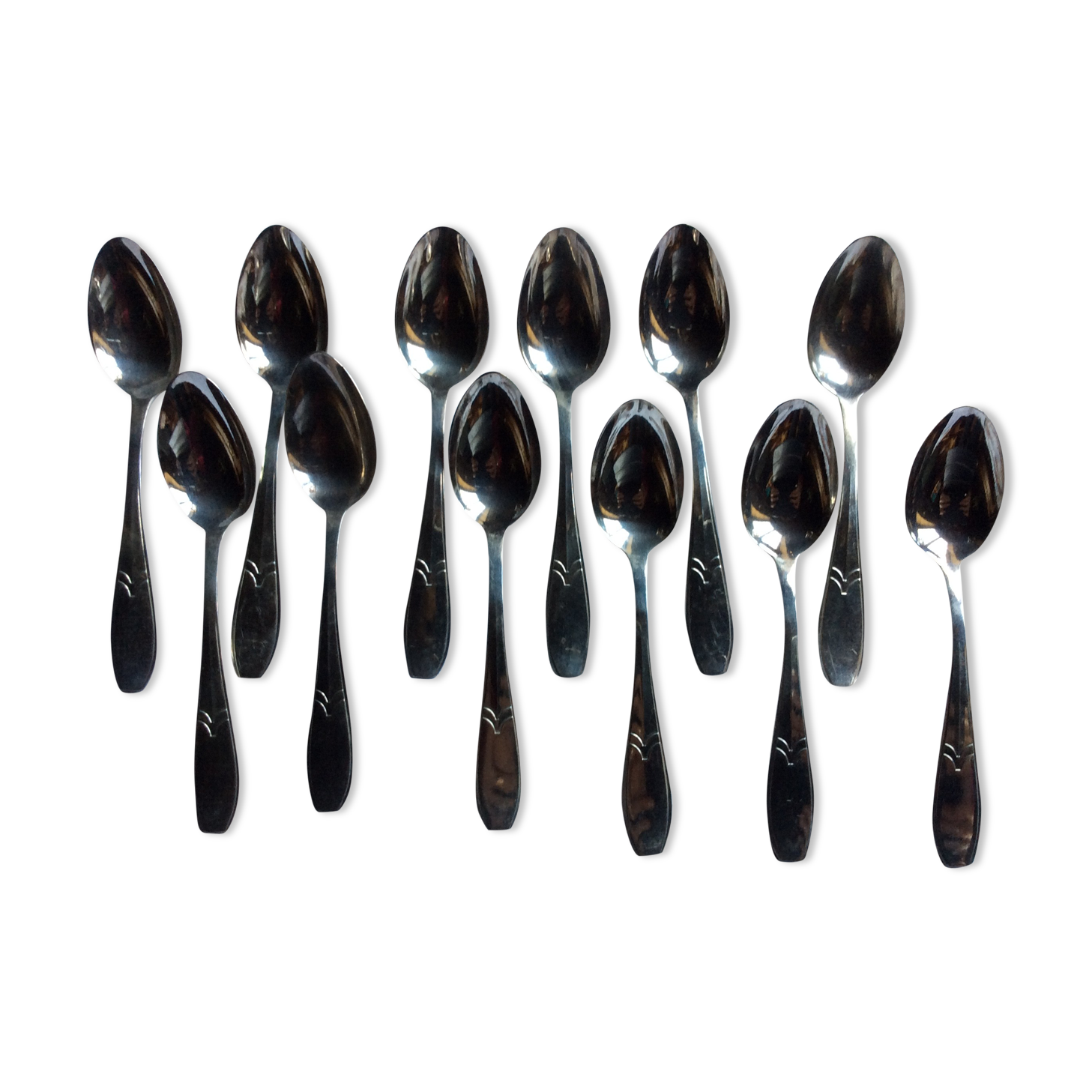 12 small art deco spoons, silver metal