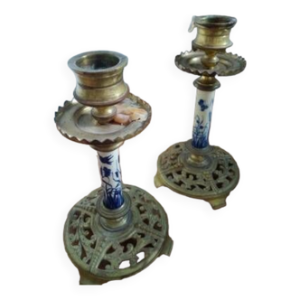 Pair of old brass and porcelain candlesticks