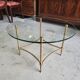 Table basse plateau verre rond et pieds laiton