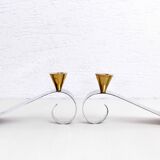 Pair of chromed metal and brass candlesticks
