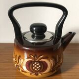 Enameled kettle with vintage stylized patterns. German brand ASTA