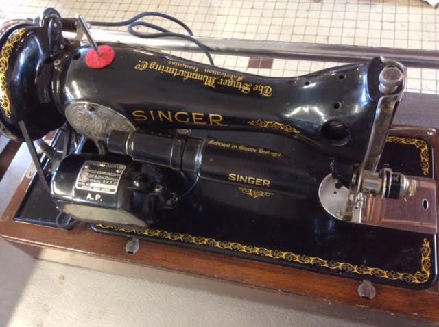 Machine à coudre singer portable