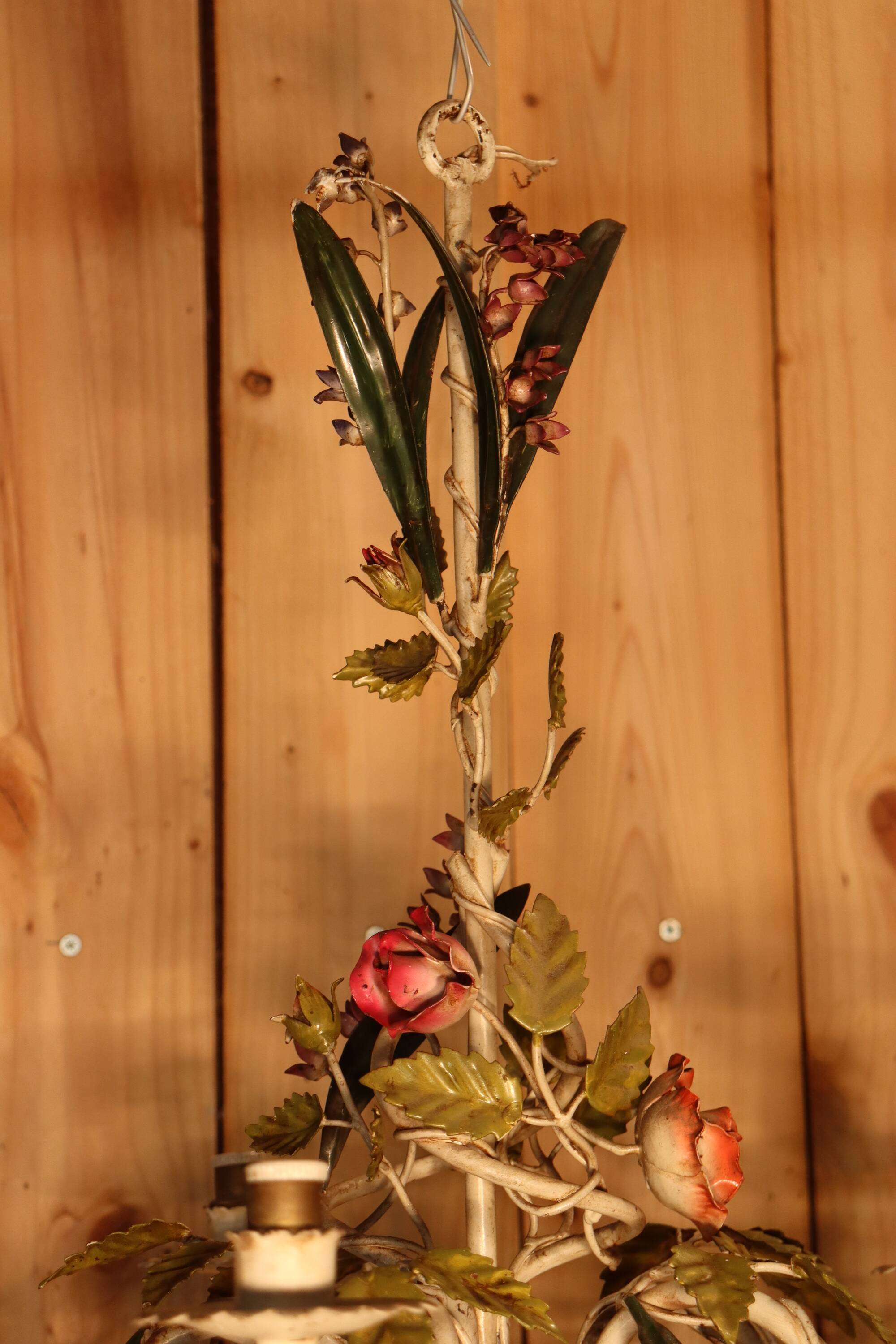 Antique iron chandelier with Art Nouveau floral decoration