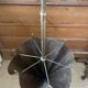 Antique repoussé brass umbrella stand