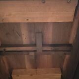 Old round table with folding shutters on casters in solid wood in very good condition