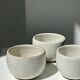 Trio of white ceramic cups D9cm