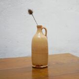 Vintage glazed terracotta bottle