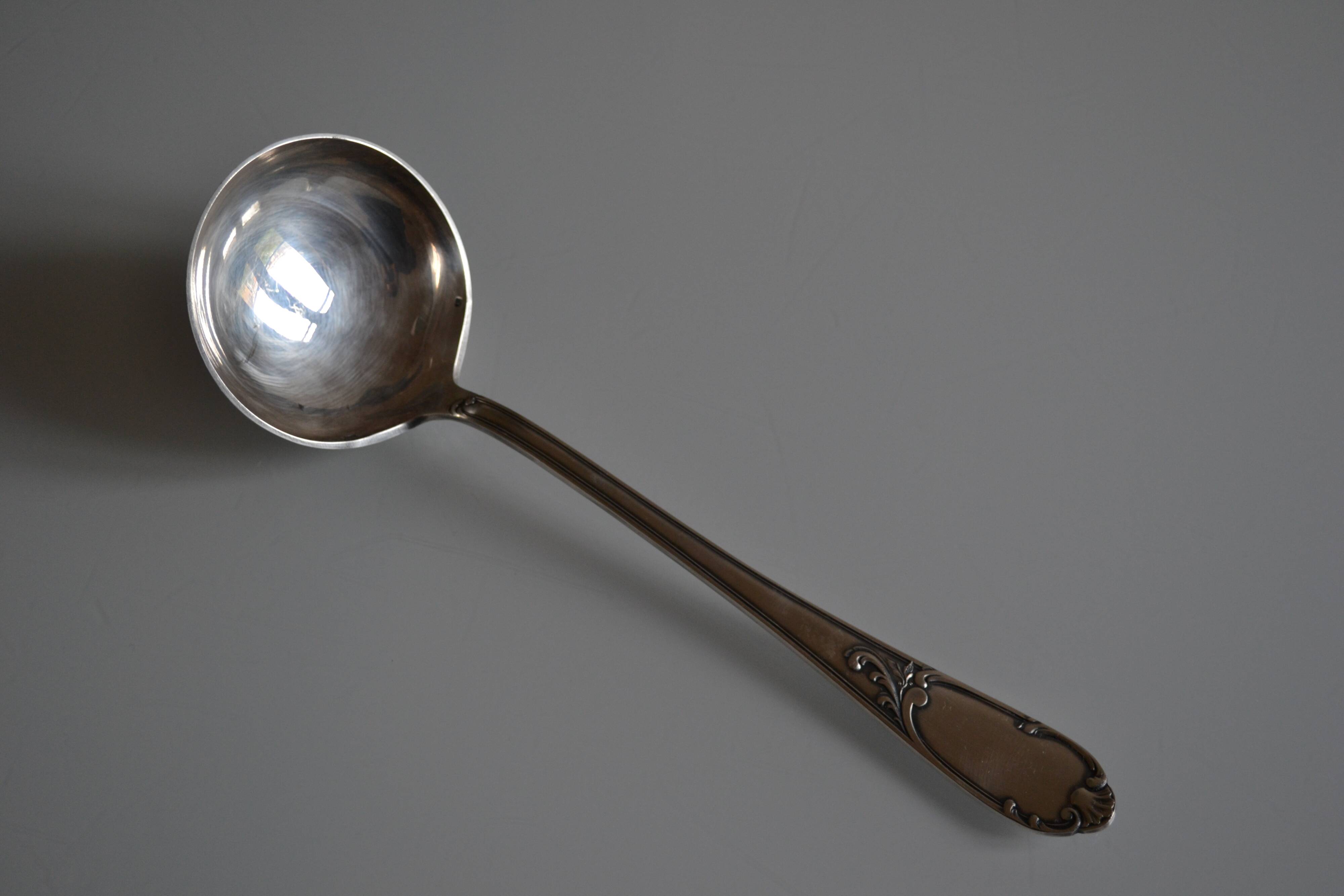 Silver metal ladle goldsmith frionnet francois