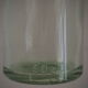 Bottle with mechanical closure in white glass