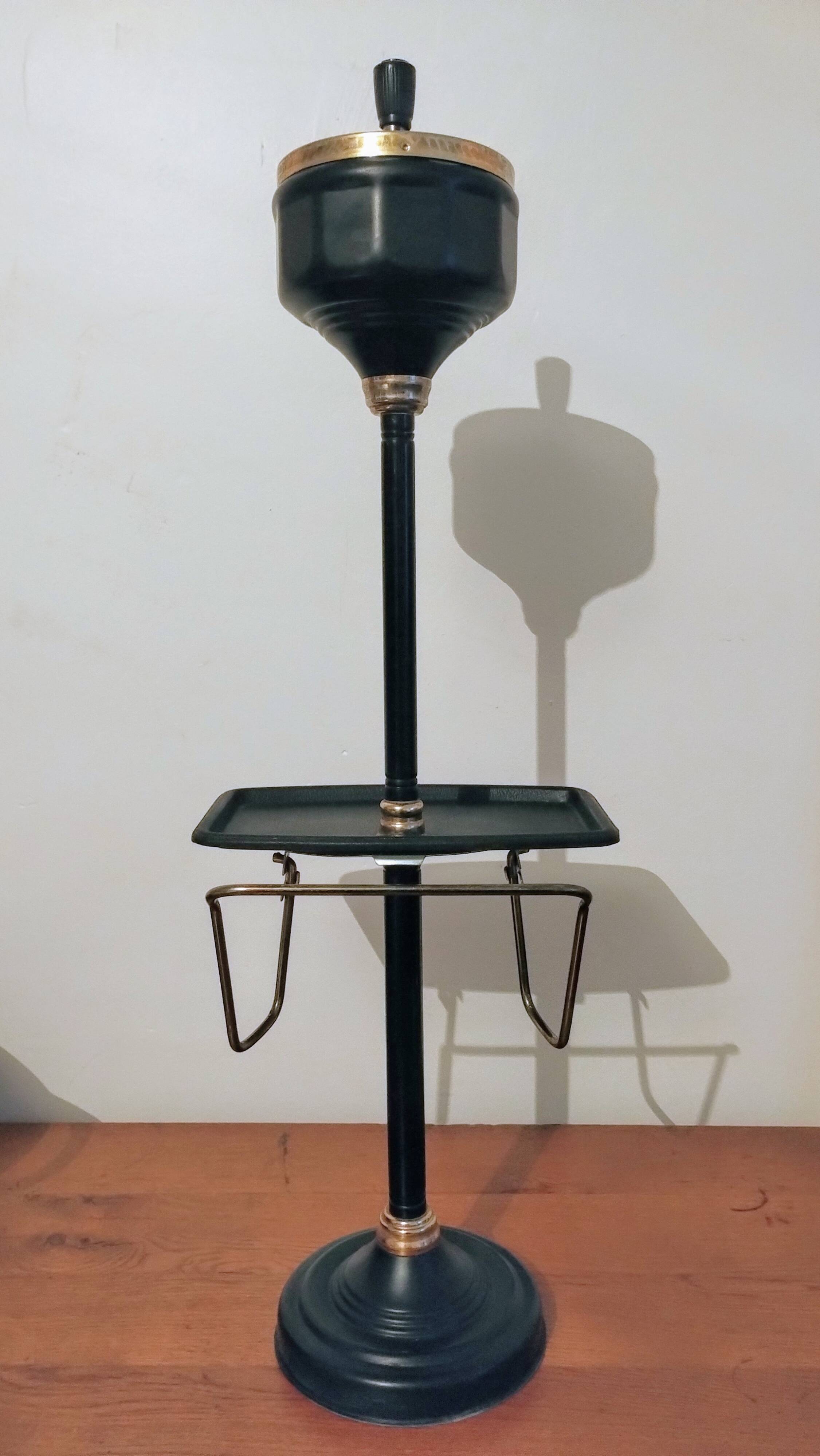 Black and gold ashtray magazine holder, mid-20th century