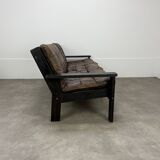 Living room sofa and brutalist armchairs in leather and wood, 70s, chalet style