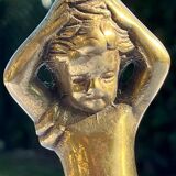 Pair of bronze cherub candlesticks 19th
