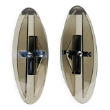 Pair of smoked glass and chrome wall lights from the 1970s.