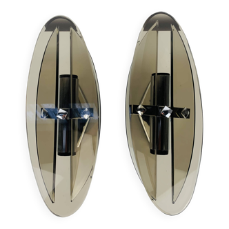 Pair of smoked glass and chrome wall lights from the 1970s.