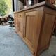Low sideboard in light solid oak with 3 doors and 1 drawer.