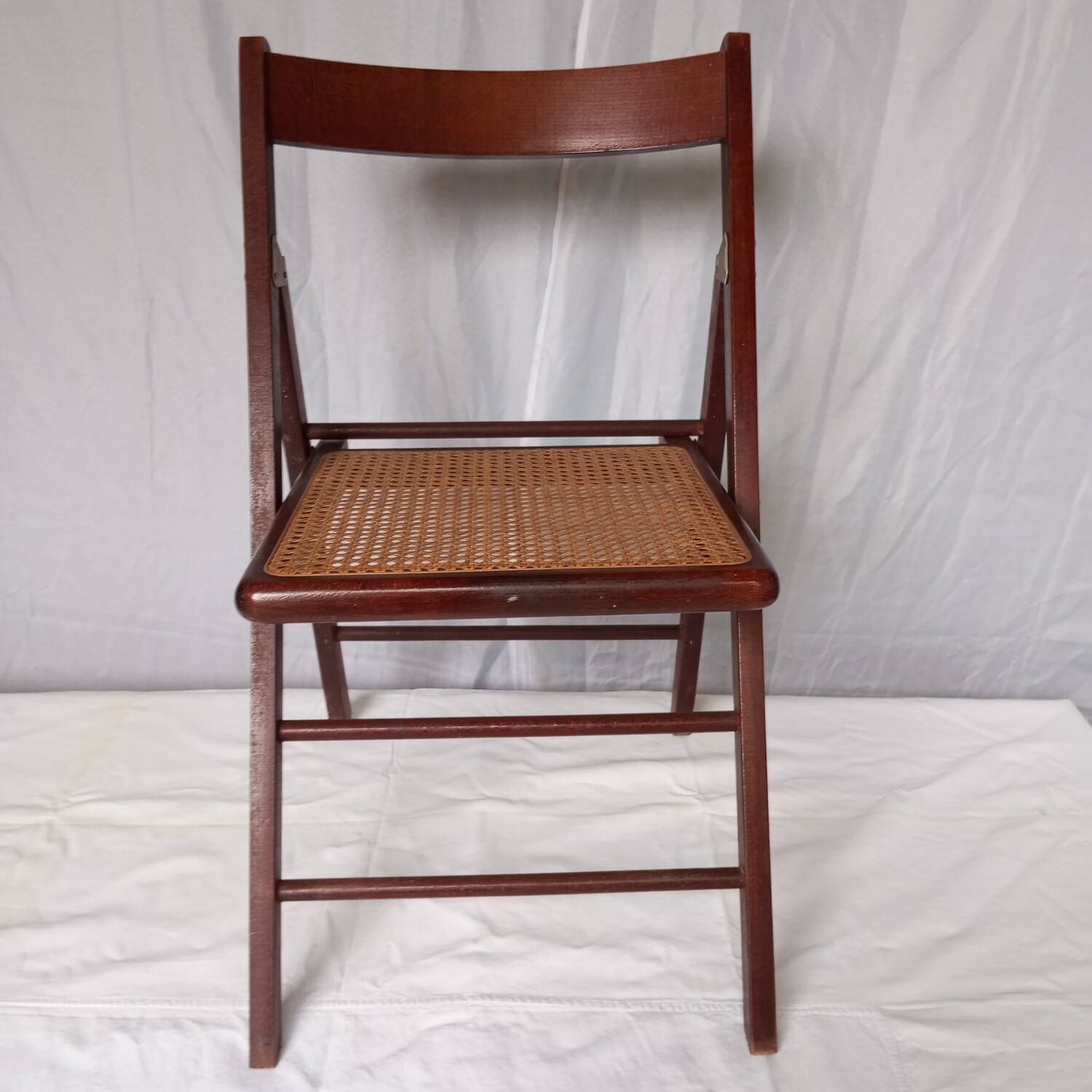 Folding wooden and cane chairs
