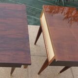 2 Bedside tables typical of the 50s in mahogany-colored varnished wood.