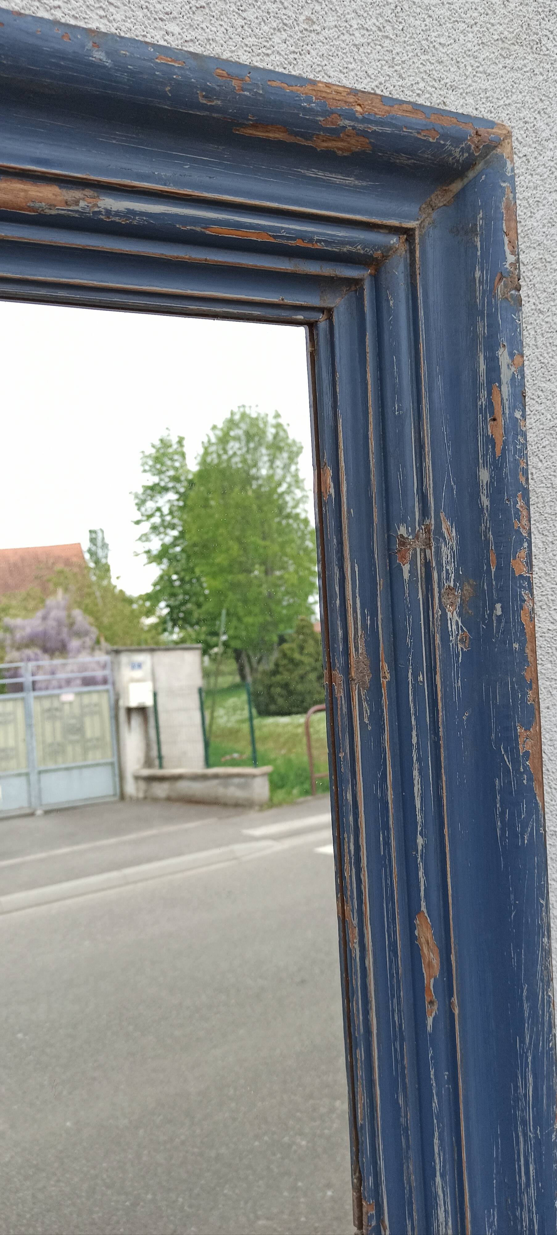 Old blue wooden mirror