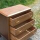Vintage oak commode with tapered legs from the 1950s.