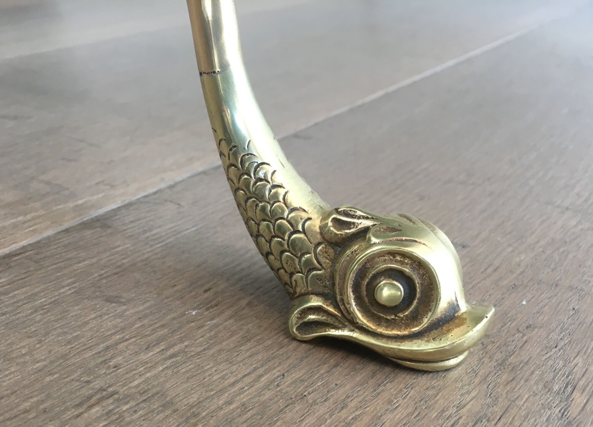 Neoclassical brass style coffee table with dolphin head decoration