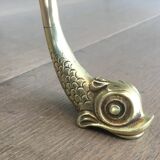 Neoclassical brass style coffee table with dolphin head decoration
