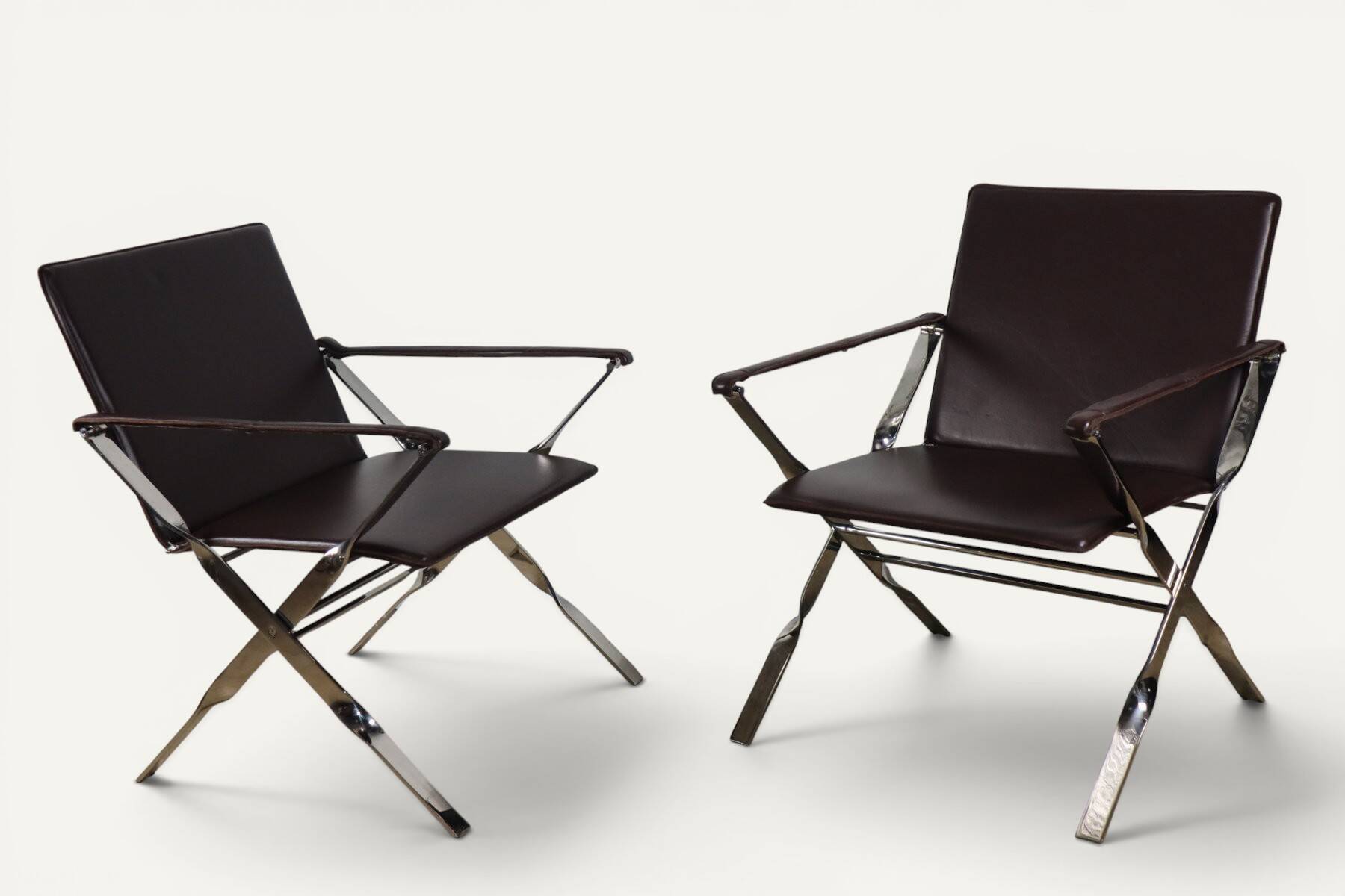 Pair of leather and chrome metal armchairs, Italy - 1970