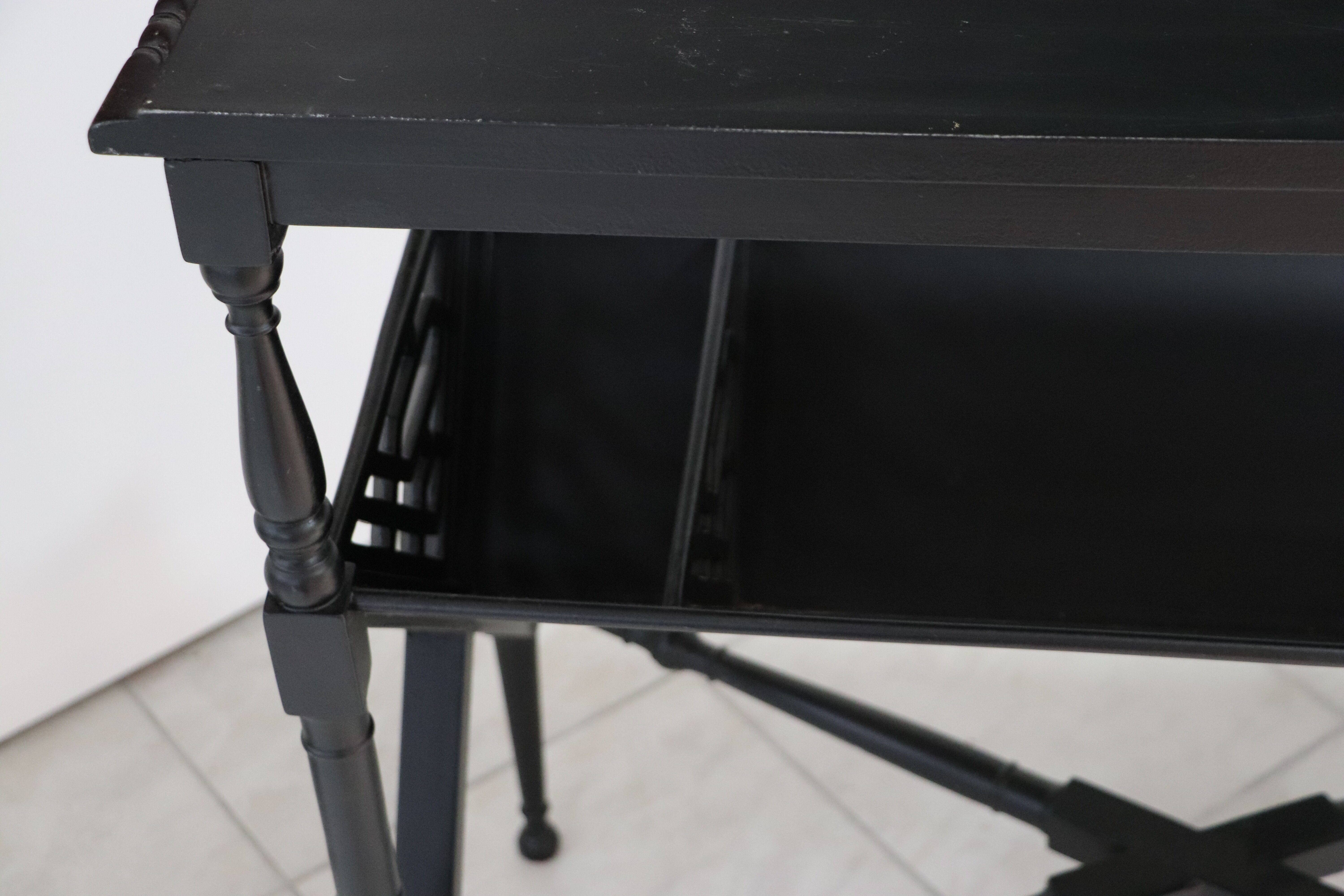 Black lacquered Indochinese console with disk storage