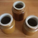 A set of 3 vintage glazed stoneware vases for indoor use.