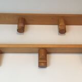 Charlotte Perriand, pair of fir wall coat racks, French work, around 1970