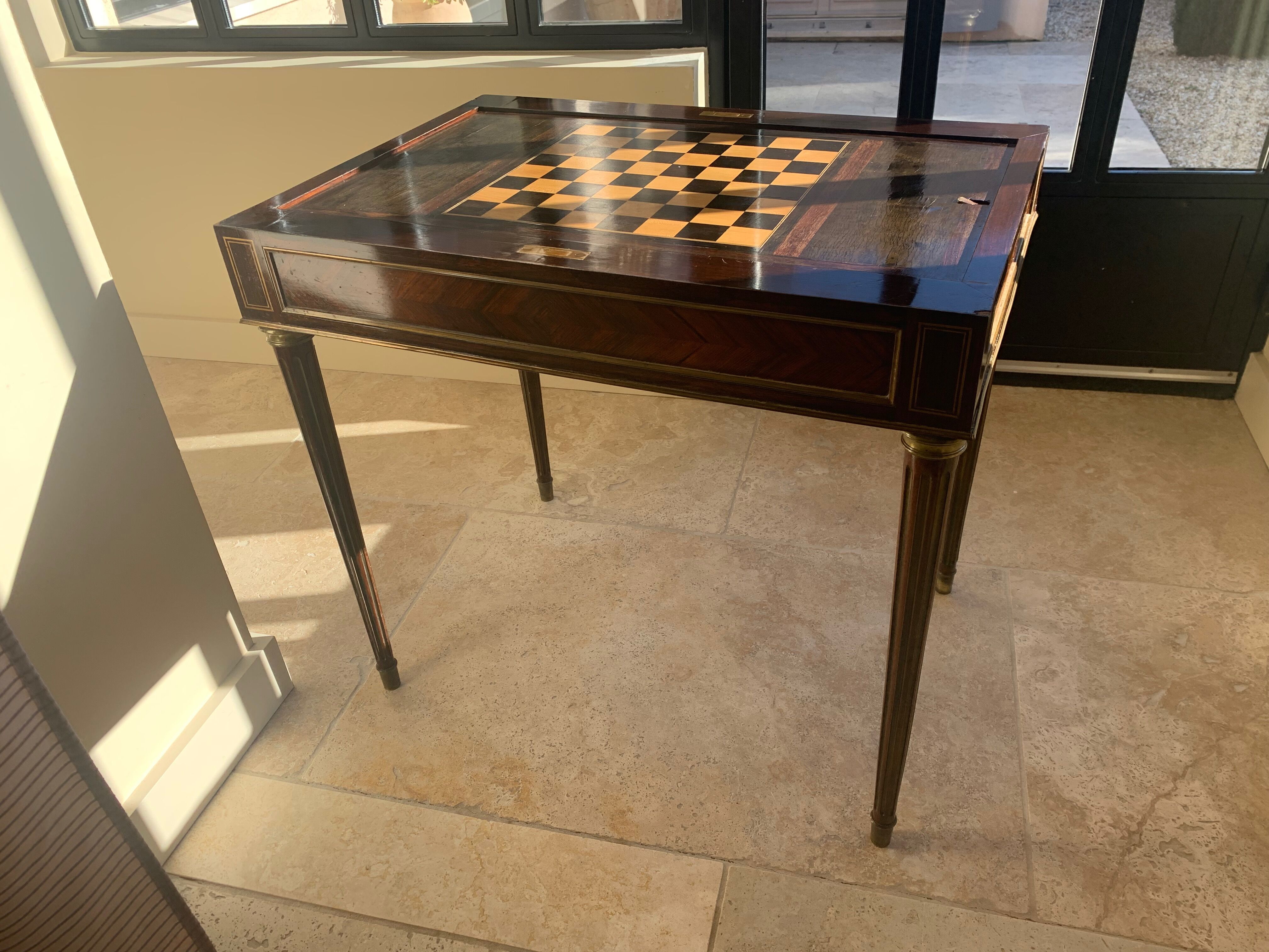 GAMES TABLE Louis XVI late nineteenth, in inlaid checkered rosewood and backgammon
