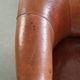 Vintage sheepskin club armchair in English style with deep colours