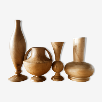Composition of 4 turned wooden vases