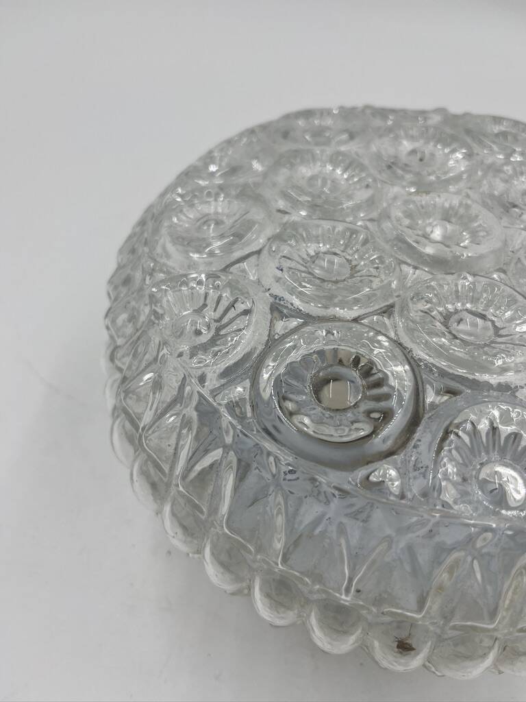 Molded glass ceiling light with relief