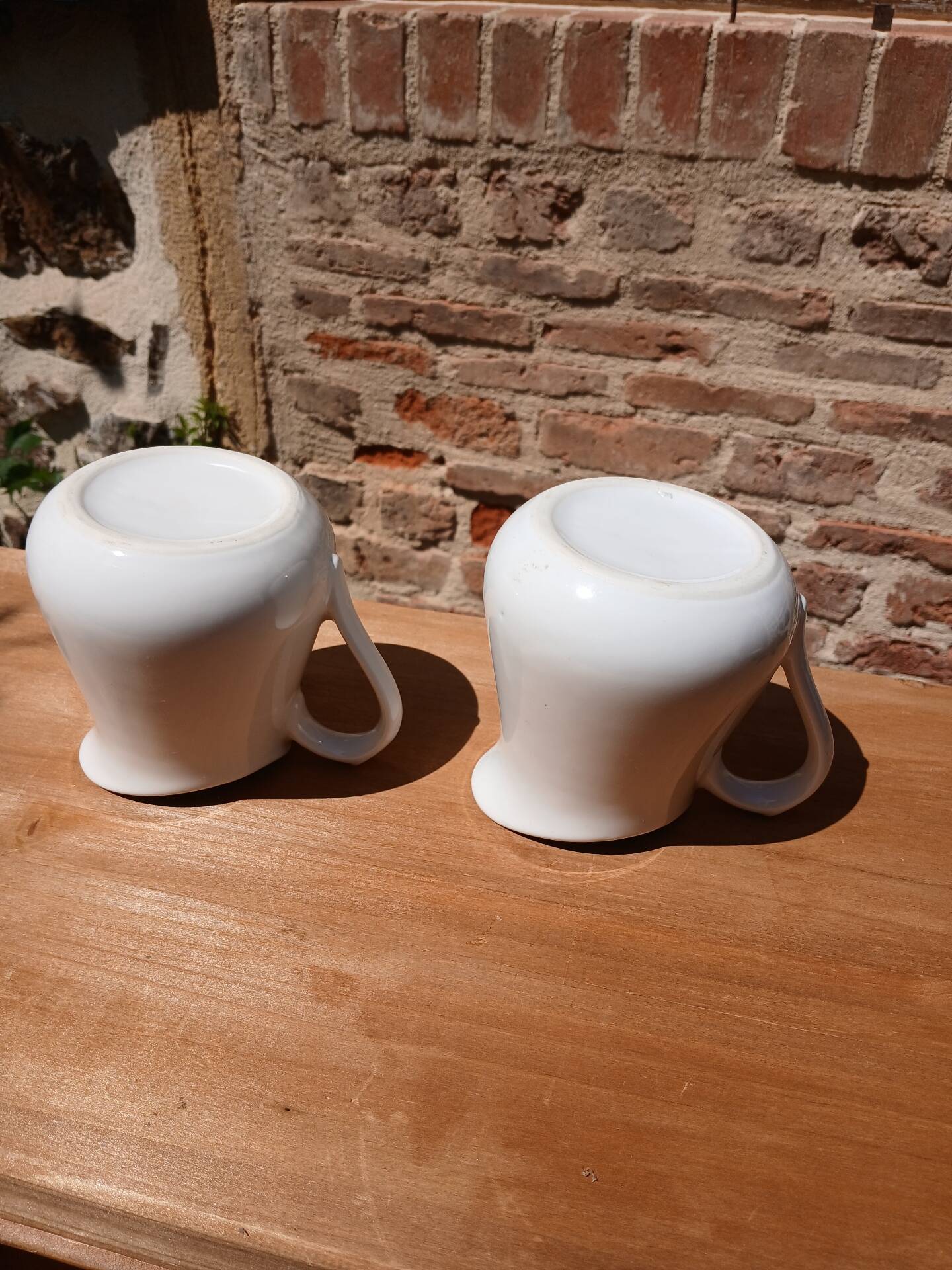 2 vintage milk jugs