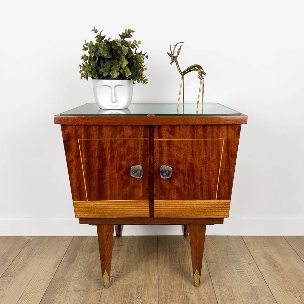 1950s bedside table in varnished wood veneer and brass.