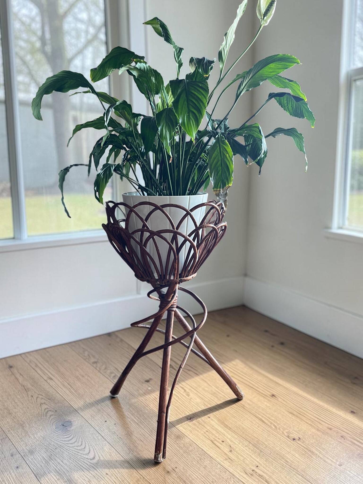 Tripod flower pot basket made of wicker, turned in the 1960s.