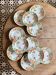 Set of 11 vintage deep plates by Eric de Moulin des Loups.