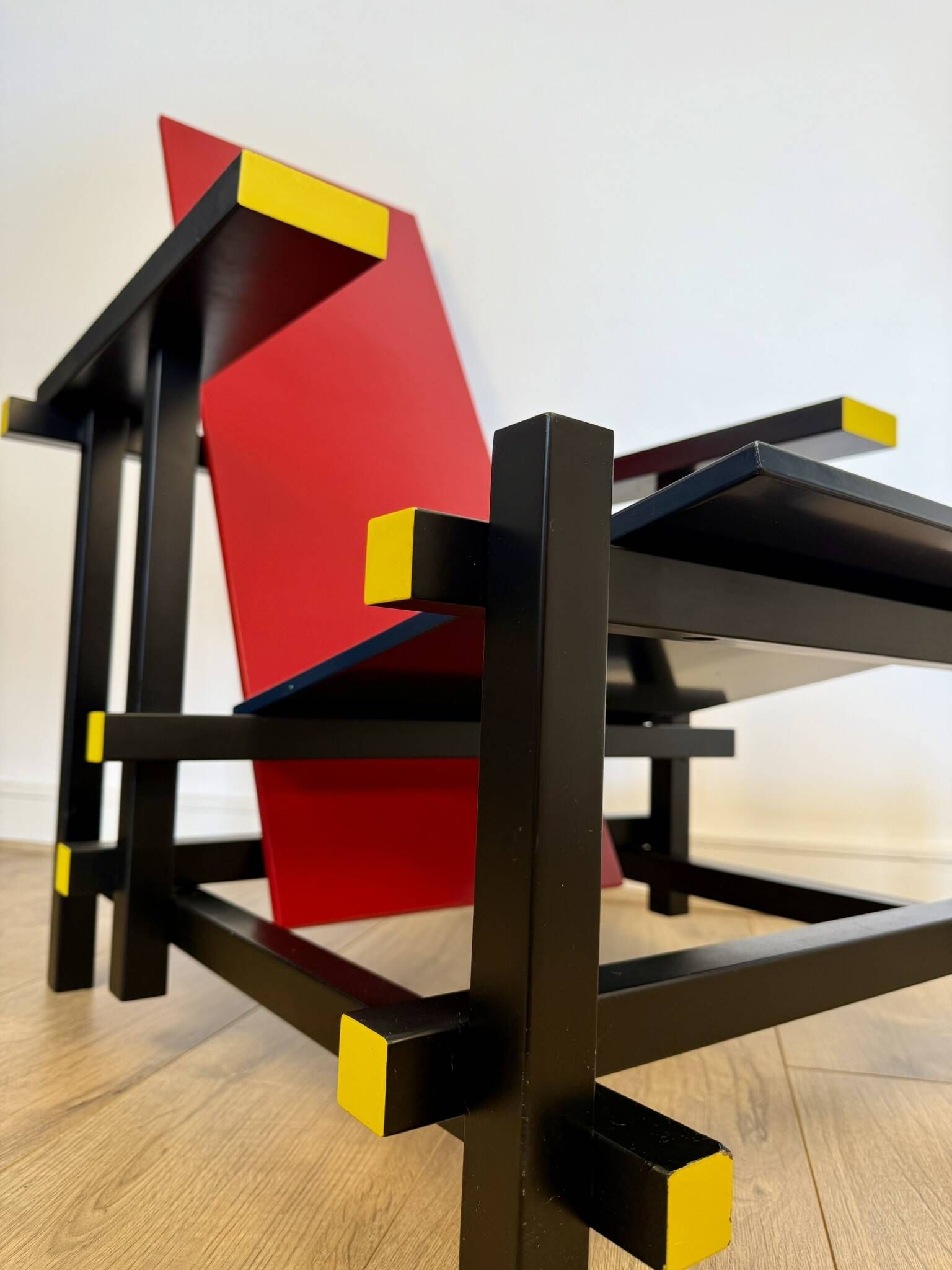 Red and Blue Chair in the Style of Gerrit Rietveld – De Stijl Movement