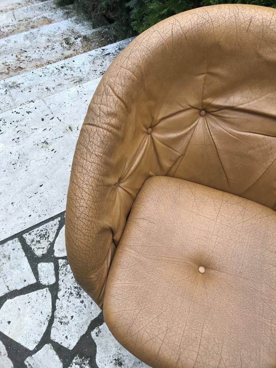 Brown tulip club chair in fibreglass resin and faux leather, France 1970s by Raphaël