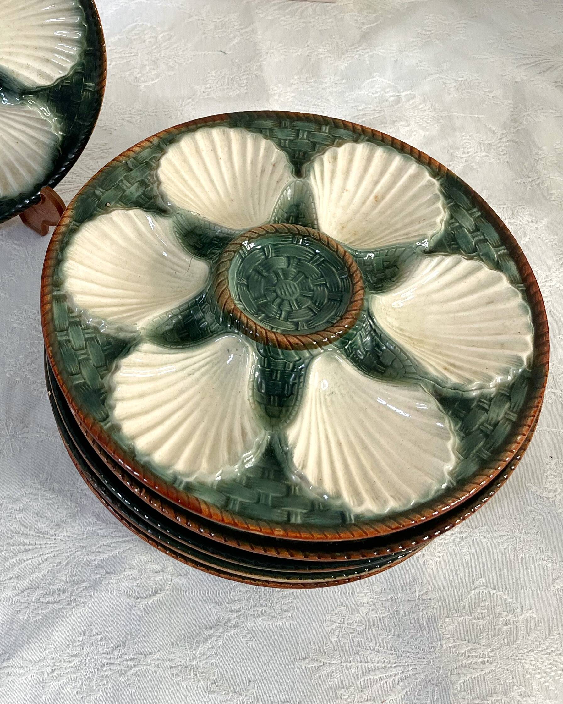Green and white slip oyster plates