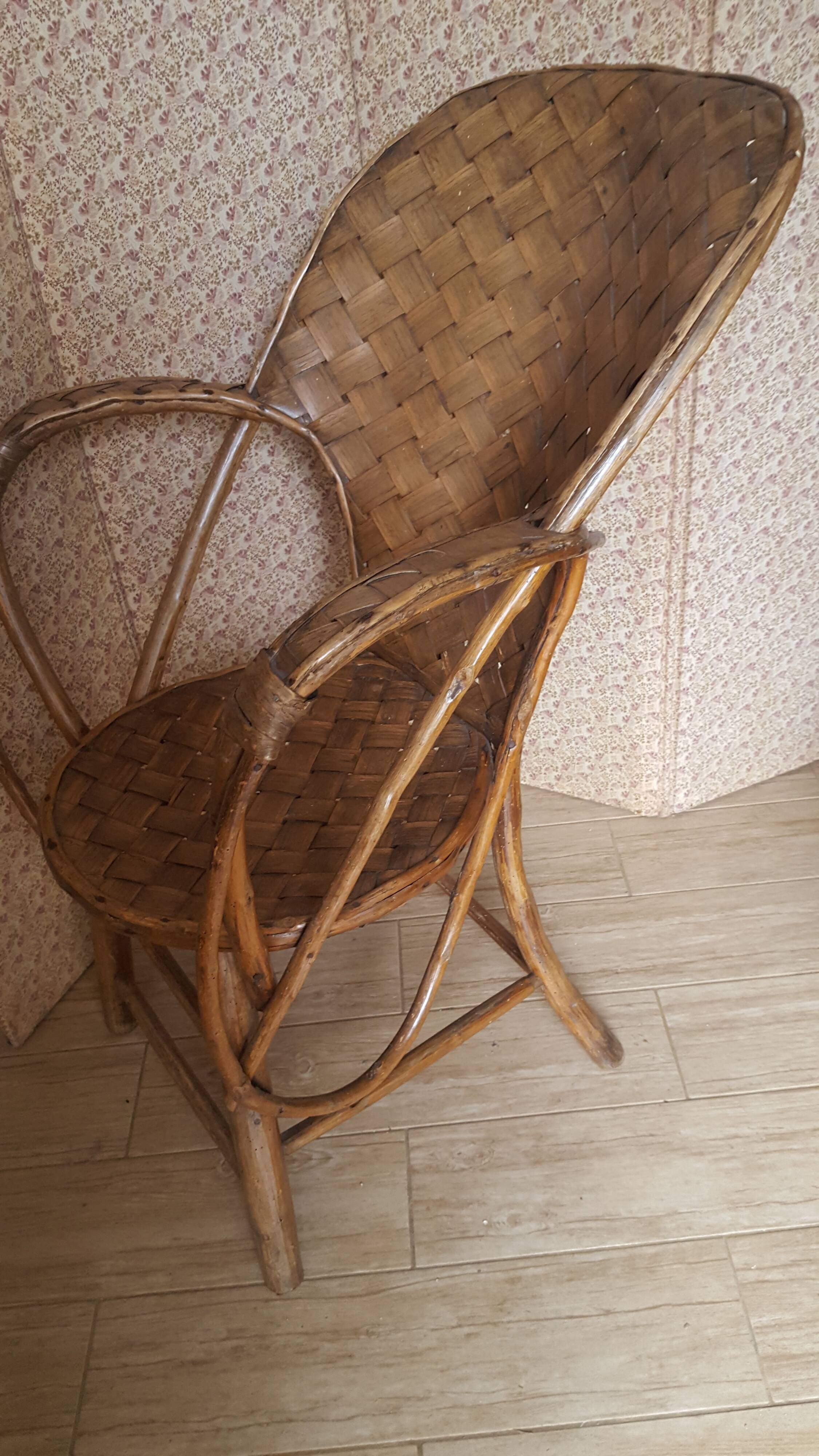 Old chair in braided chestnut