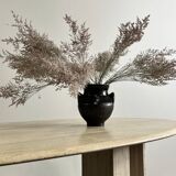 Oval travertine table