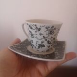 Black and white cups with plates