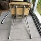Duo de chaises en formica imitation bois marron et pieds eiffel