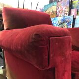 Red armchair with decorated base