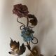 Two bronze wall light decorated with flowers in german porcelain